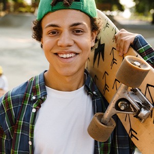 Dallas athlete skateboarding with friends