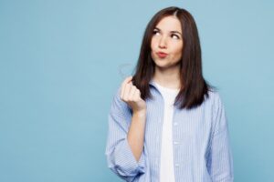 Woman wondering if she can get cavities with Invisalign